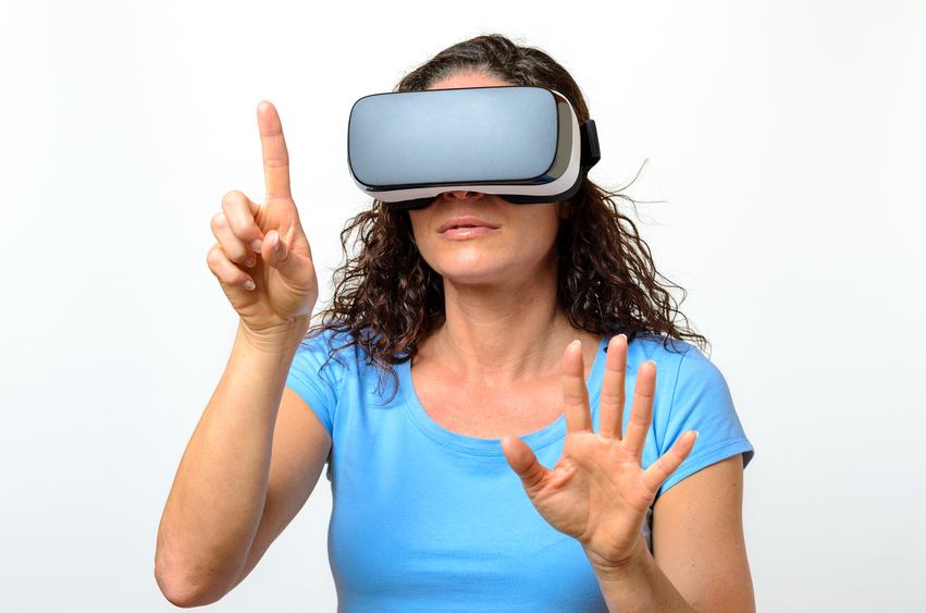Woman experiencing a virtual environment