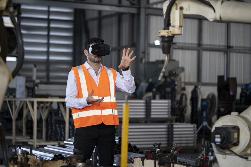 Engineer using VR in a warehouse 