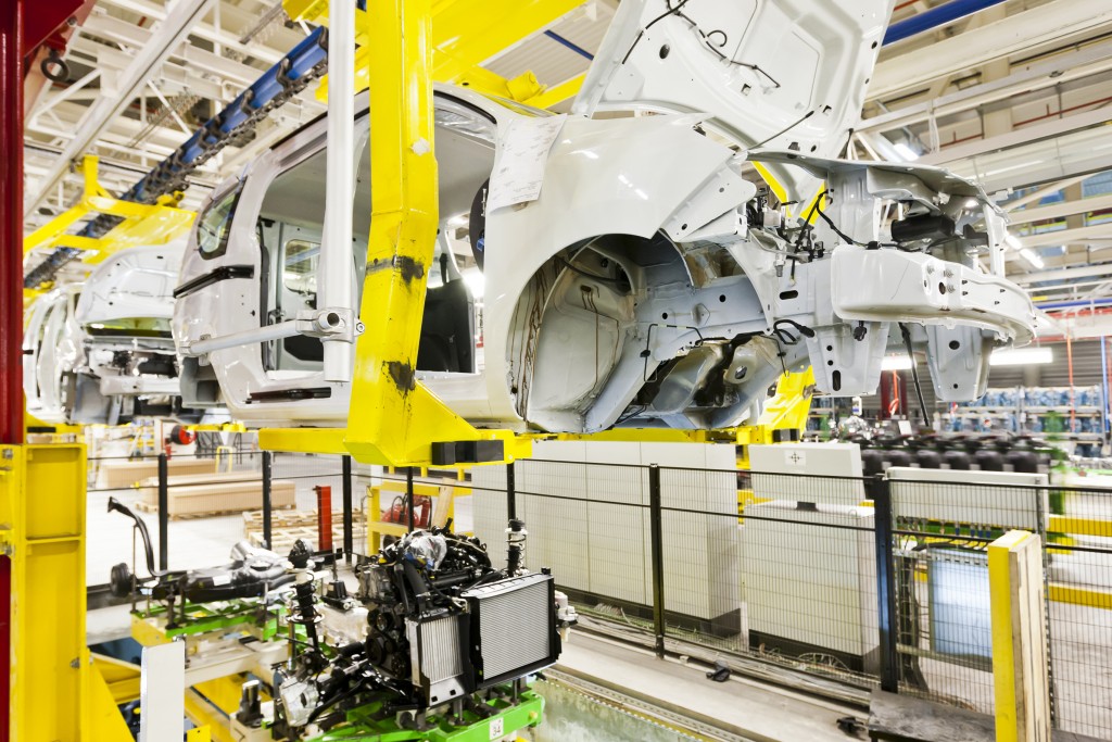 Empty car body shells on production line