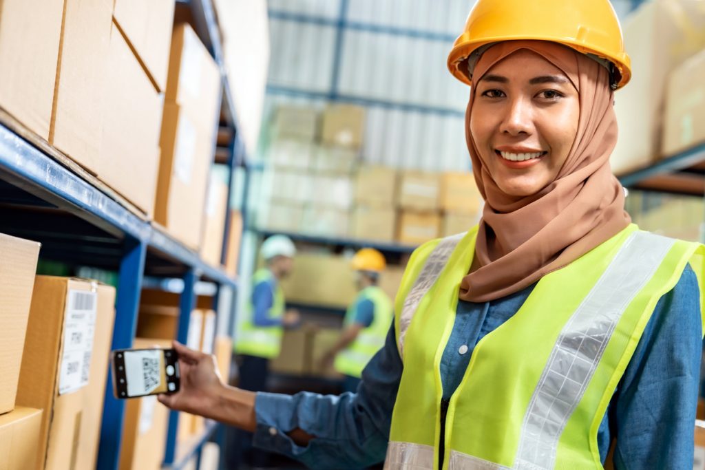 Female engineer working in a manufacturing warehouse