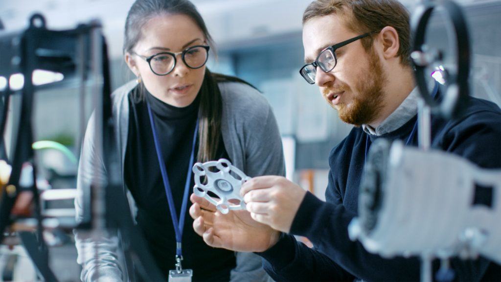 mentor teaching STEM student