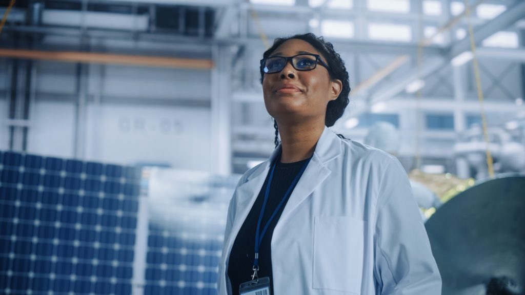 young woman in labcoat