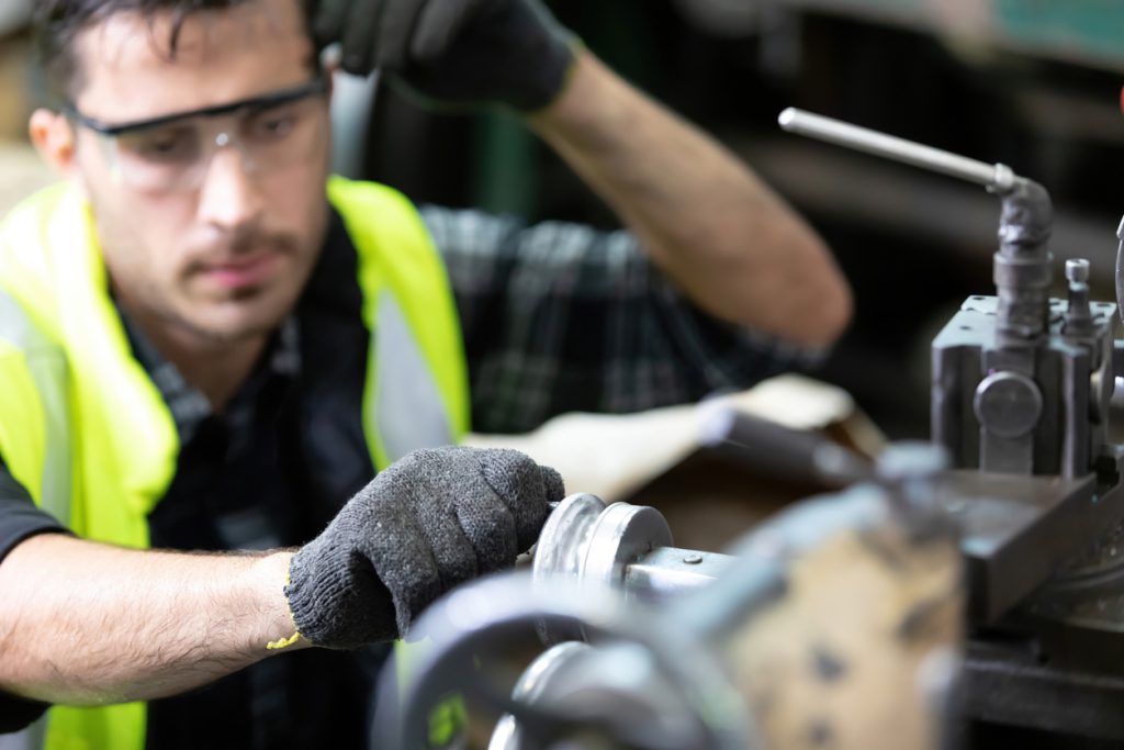 engineers working on machinery