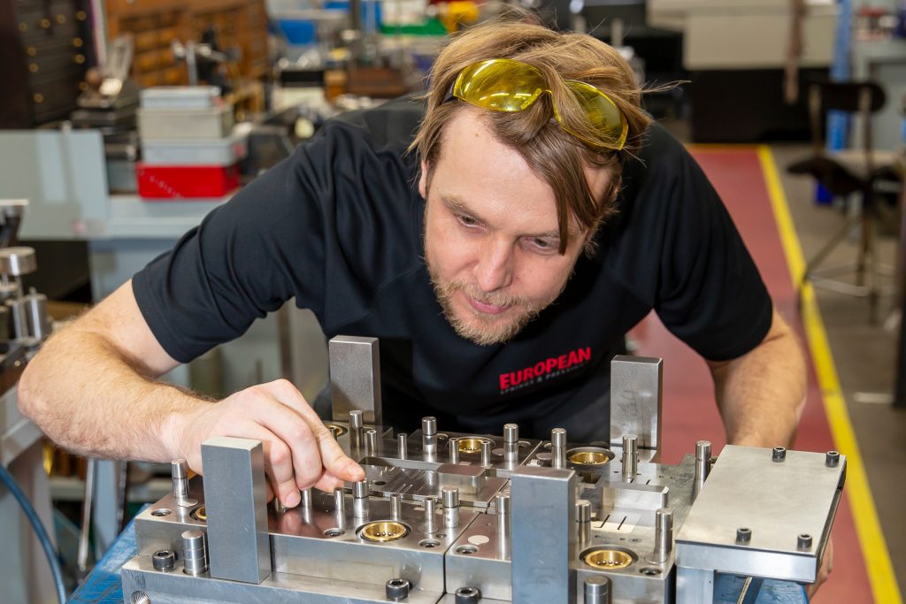 Young European Springs apprentice at work