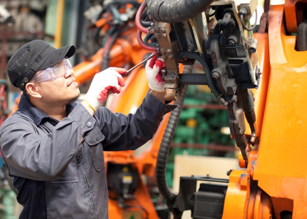 Someone working on a machine