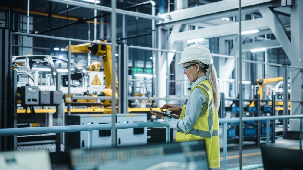 Female manufacturer working in a smart factory