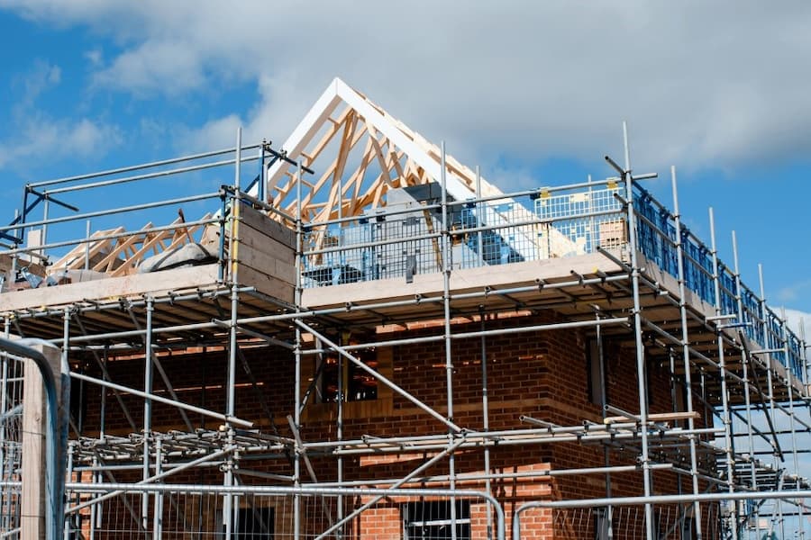 A building under construction with scaffolding