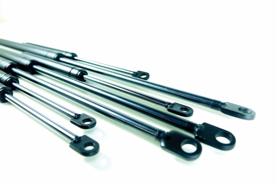 Several metal rods with holes
