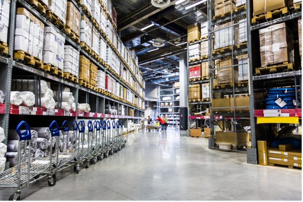 A warehouse with carts and boxes