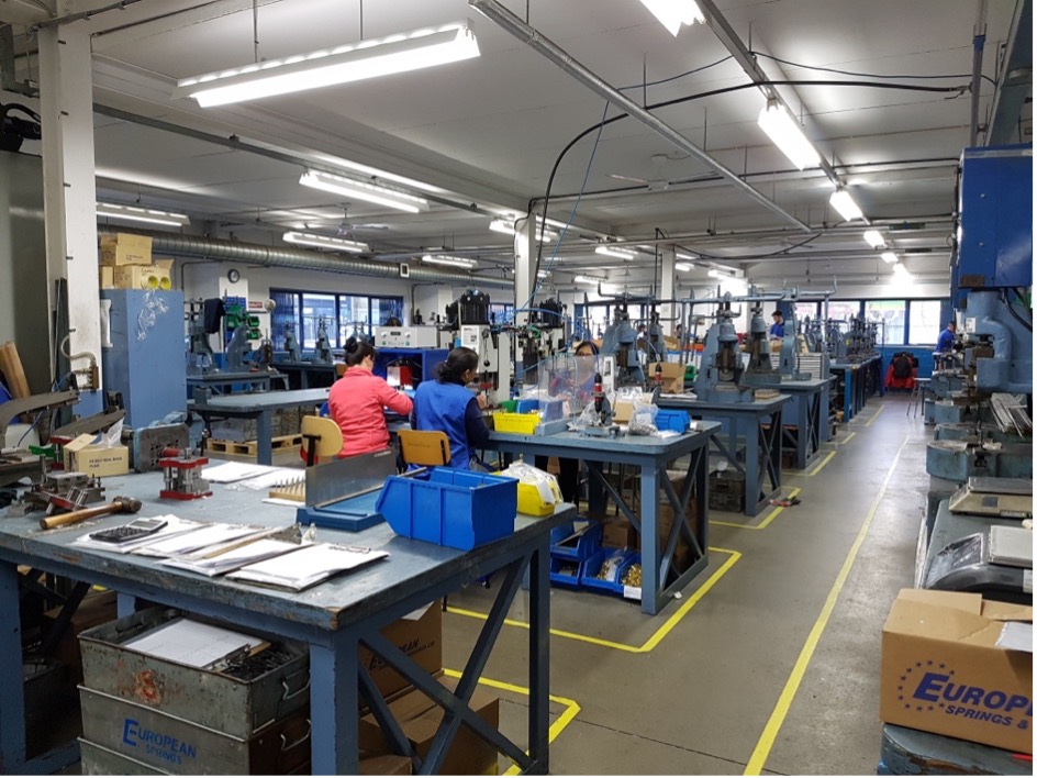 A group of people working in a factory
